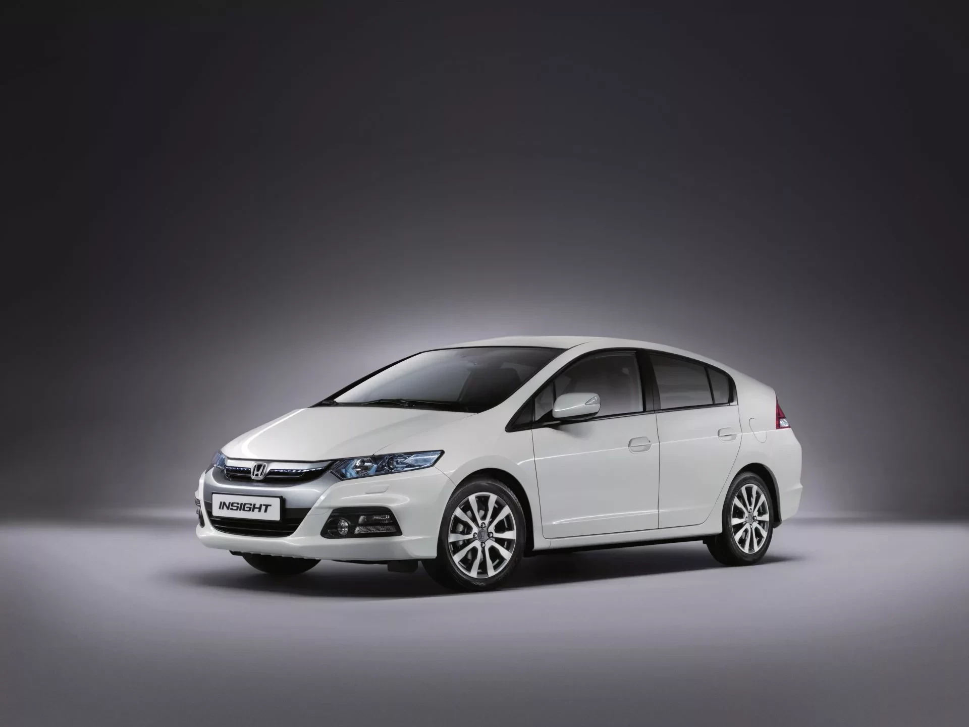 Honda Insight cena spalanie Toyota Prius silnik hybryda awarie oceny opinie