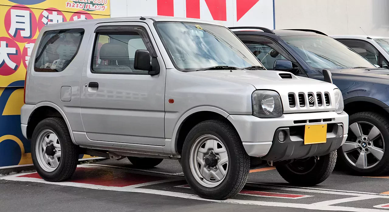 Suzuki Jimny silnik moc terenowy samochód cena spalanie osiagi napęd