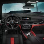 SUV BMW X5 benzyna diesel silnik cena ceny spalanie moc osiągi wyposażenie zalety wady opinie oceny