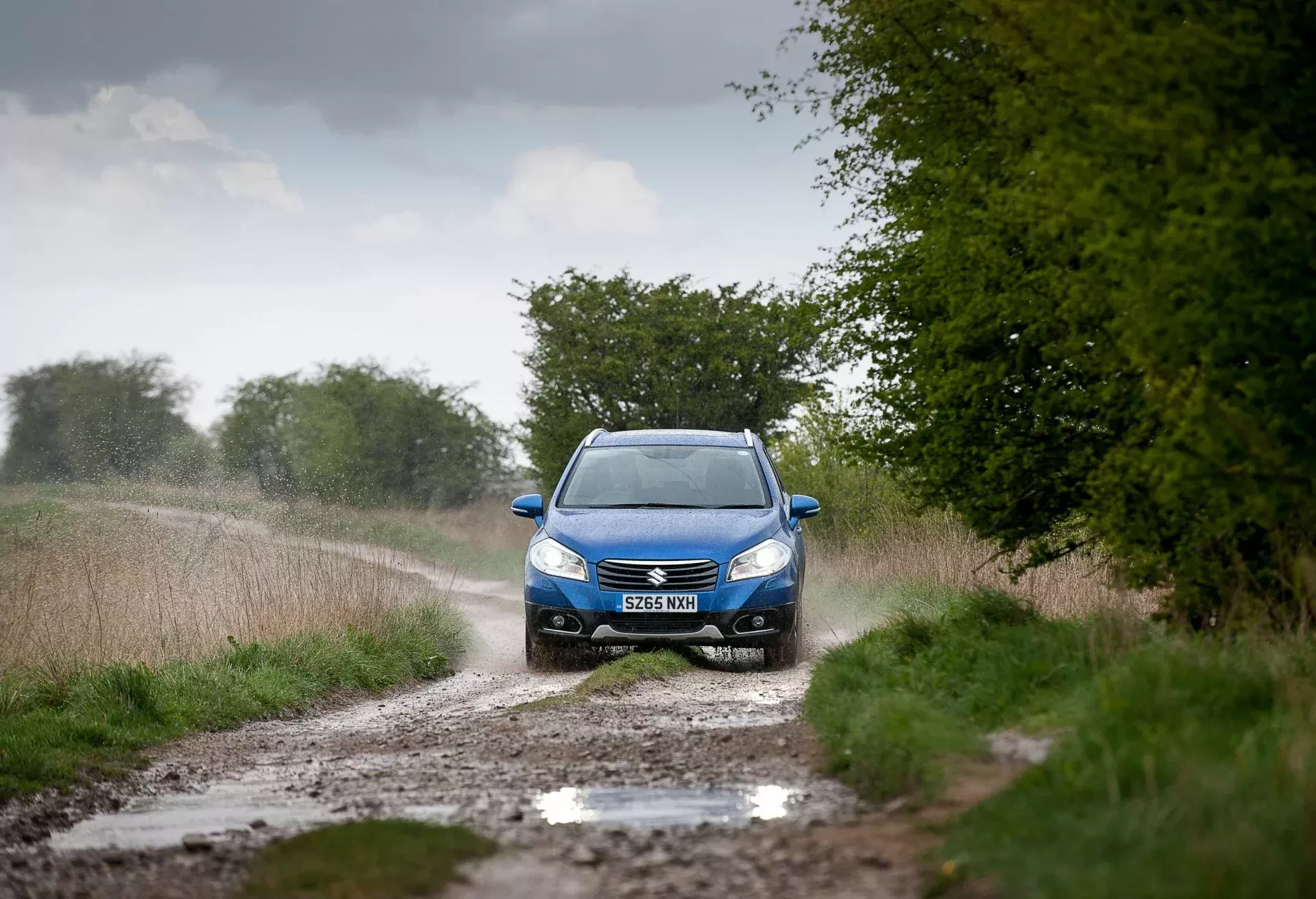 Suzuki SX4 silnik cena spalanie napęd opinie oceny zalety wady na zimę SUV crossover