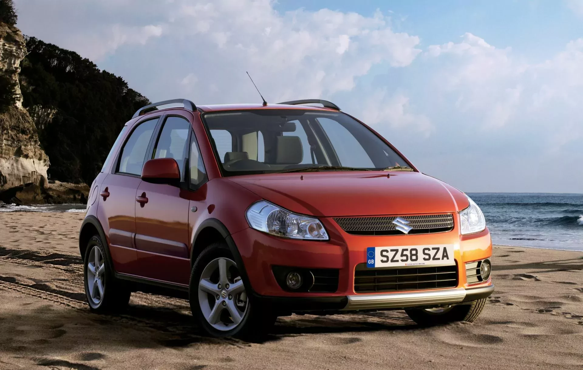 Suzuki SX4 silnik cena spalanie napęd opinie oceny zalety wady na zimę SUV crossover