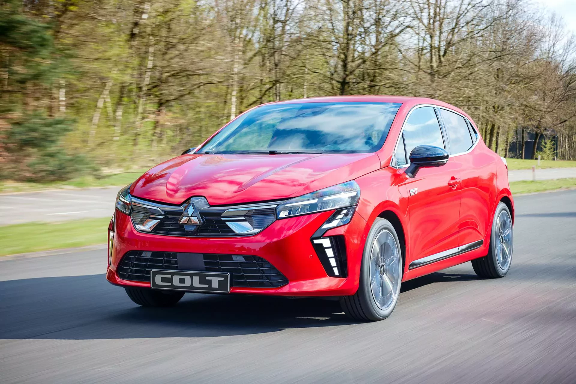 Mitsubishi Colt hatchback silnik benzyna hybryda nowy używany cena ceny opinie oceny zalety wady Renault Clio porównanie