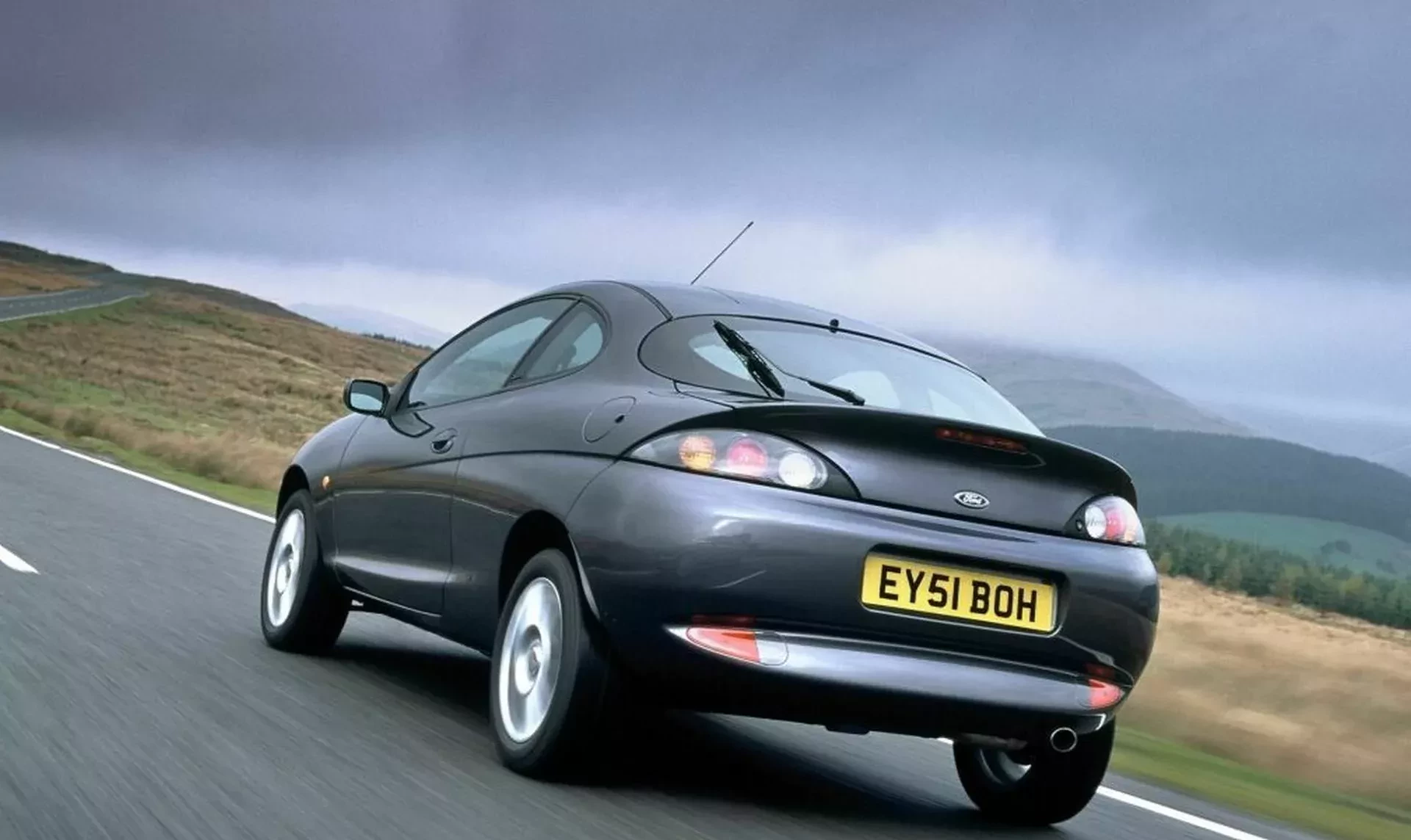 Ford Puma silnik benzyna moc osiągi pojemność cena ceny opinie oceny zalety wady coupe pierwsza generacja