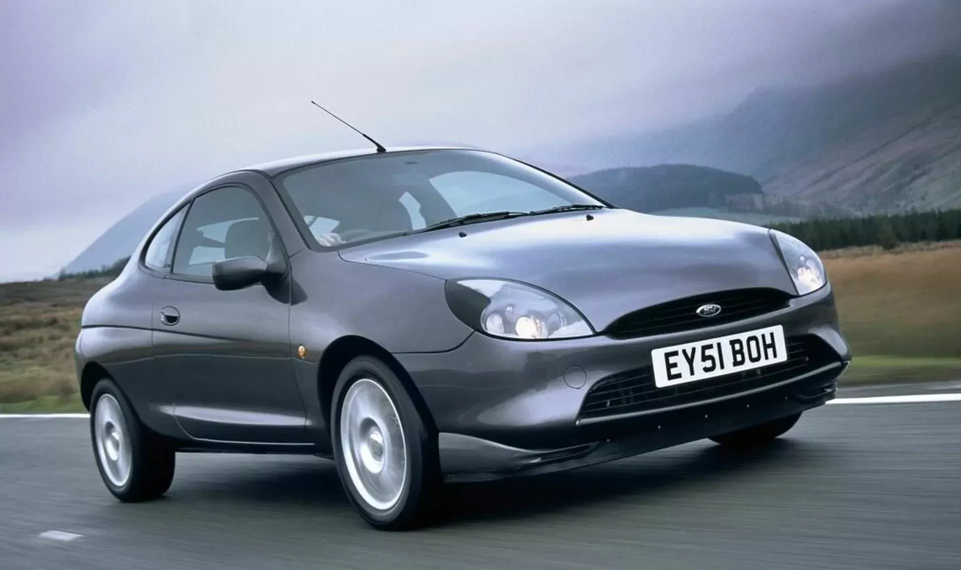 Ford Puma silnik benzyna moc osiągi pojemność cena ceny opinie oceny zalety wady coupe pierwsza generacja