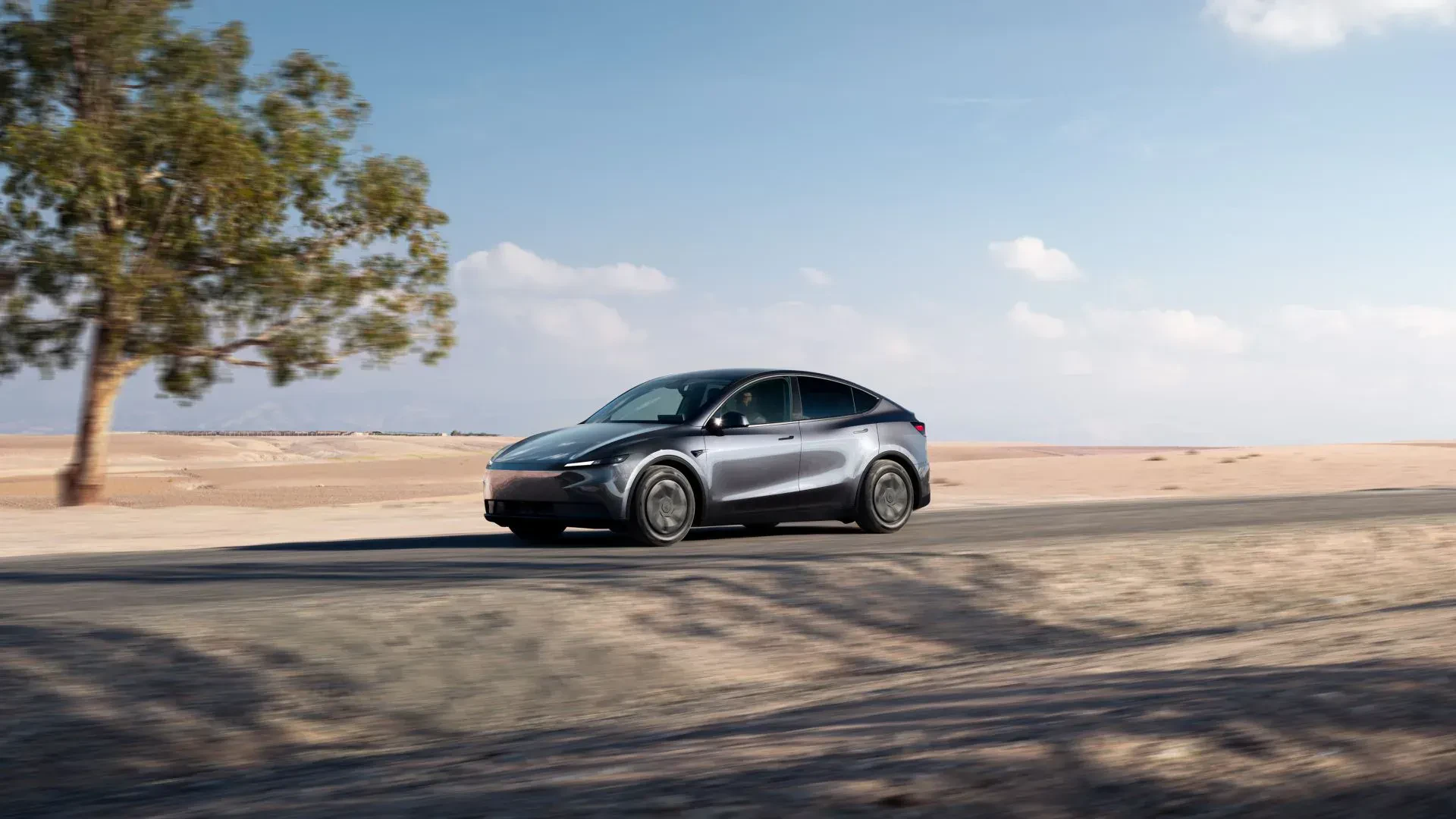 crossover Tesla Model Y silnik moc osiągi elektryczna opinie oceny zalety wady cena ceny zasięg